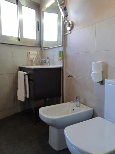 Habitación Triple Confort del hotel 170. Foto 8
