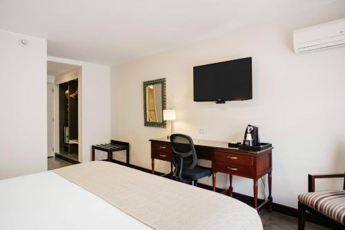 Habitación de matrimonio Estándar del hotel Wyndham Costa Del Sol Cusco. Foto 1