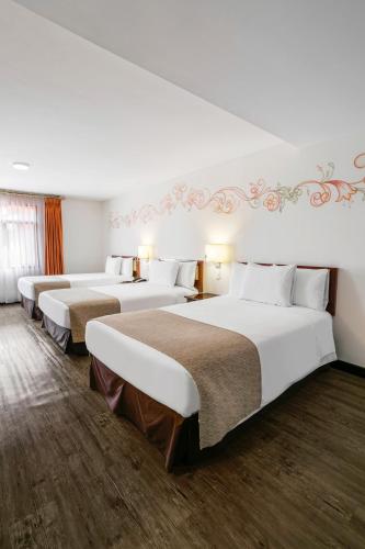 Habitación Triple Estándar del hotel Wyndham Costa Del Sol Cusco. Foto 1