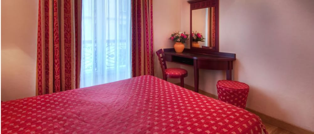 Habitación con 2 camas individuales del hotel De Paris Opéra. Foto 1