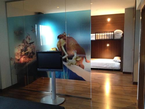 Habitación cuádruple del hotel Tach Madrid Airport. Foto 1