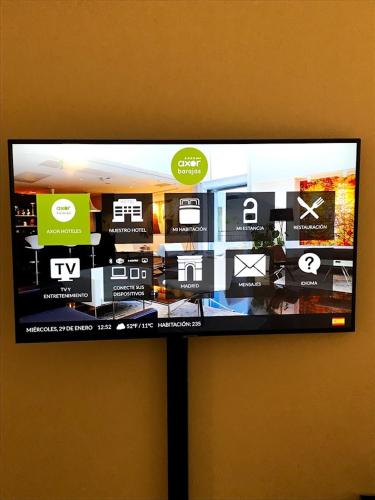 Habitación Familiar con servicio gratuito de enlace con el aeropuerto del hotel Axor Barajas. Foto 7