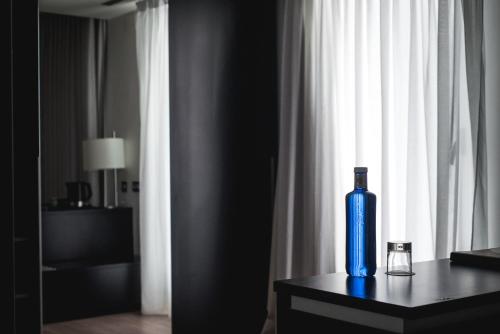 Habitación Doble Premium con servicio gratuito de enlace con el aeropuerto del hotel Axor Feria. Foto 11