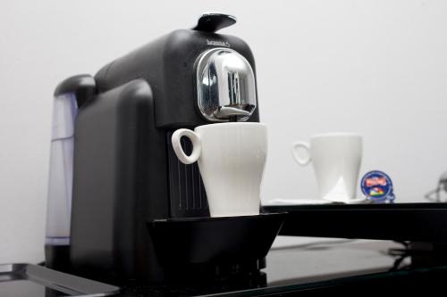 Habitación Doble Premium con servicio gratuito de enlace con el aeropuerto del hotel Axor Feria. Foto 14