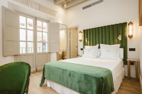 Habitación Doble con balcón del hotel Boutique Casas De Santa Cruz. Foto 4