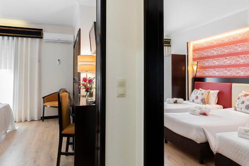 Suite Familiar 5 camas individuales del hotel Jardim. Foto 1