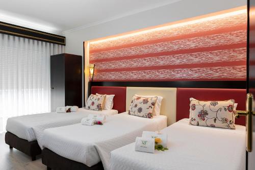 Suite Familiar 5 camas individuales del hotel Jardim. Foto 2