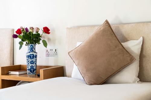 Habitación Triple del hotel Lancaster Court