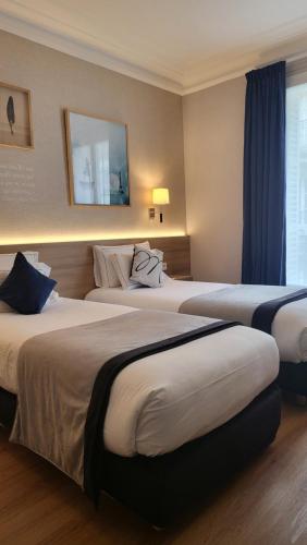 Habitación Twin Superior del hotel Magda Champs Elysées. Foto 1
