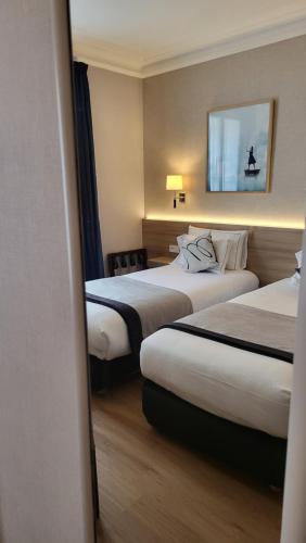 Habitación Twin Superior del hotel Magda Champs Elysées. Foto 2
