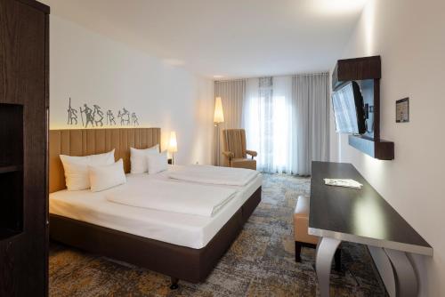 Habitación Doble Superior del hotel Arcotel Camino. Foto 1