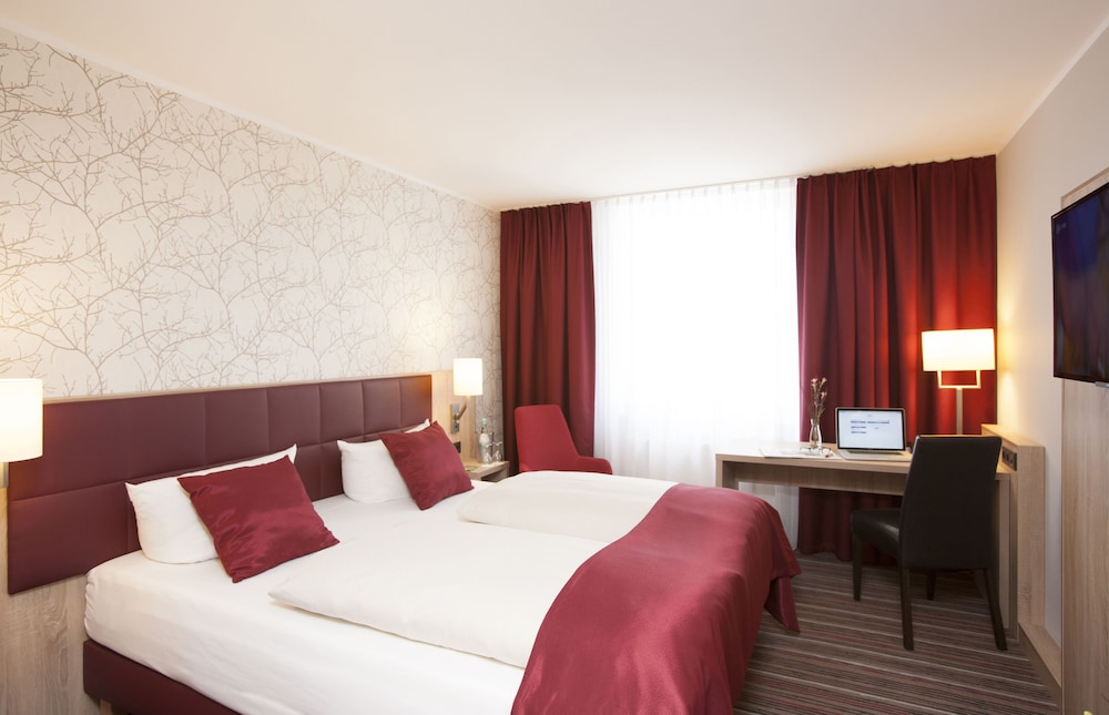 HABITACIÓN SUPERIOR con 1 cama king size del hotel Fora Hannover By Mercure. Foto 2