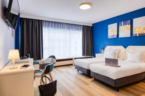 Habitación Doble Clásica - 2 camas del hotel First Euroflat. Foto 9