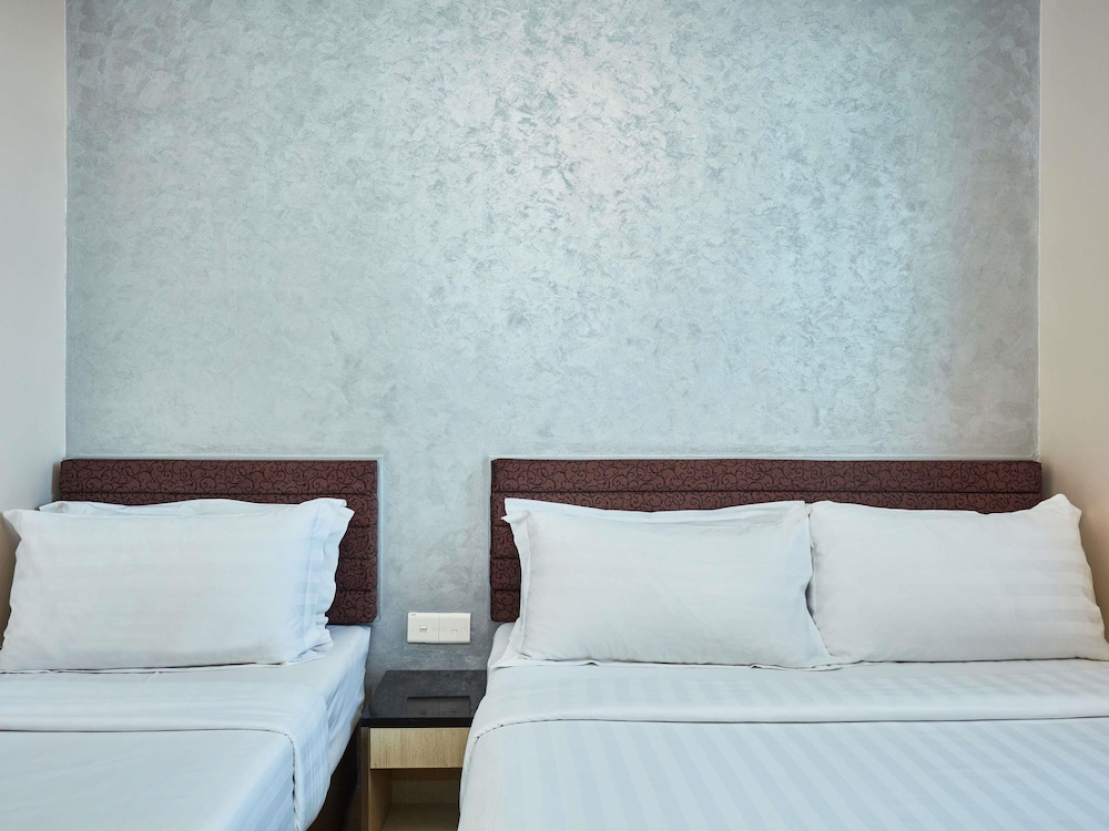 Habitación Superior con 1 cama doble y 1 cama individual del hotel Ibis Budget Singapore Mount Faber (sg Clean). Foto 2