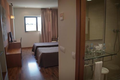 Habitación Doble del hotel Hotel AS Hoteles Torrent. Foto 13