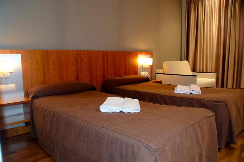 Habitación Triple del hotel Hotel AS Hoteles Torrent. Foto 1
