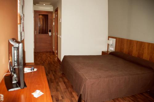 Habitación Deluxe - 1 cama grande del hotel Hotel AS Hoteles Torrent. Foto 8