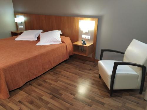 Habitación Deluxe - 1 cama grande del hotel Hotel AS Hoteles Torrent. Foto 11