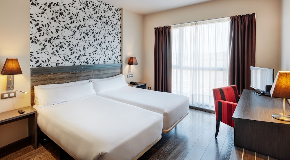Habitación Triple del hotel Sercotel Plaza Feria. Foto 4