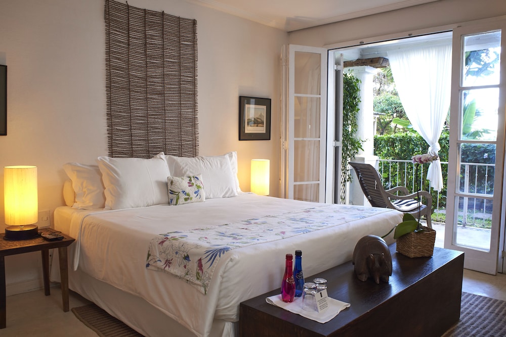 HABITACIÓN DELUXE SERENITY con 1 cama king size y vistas al jardín del hotel Santa Teresa Hotel Rj - Mgallery. Foto 2