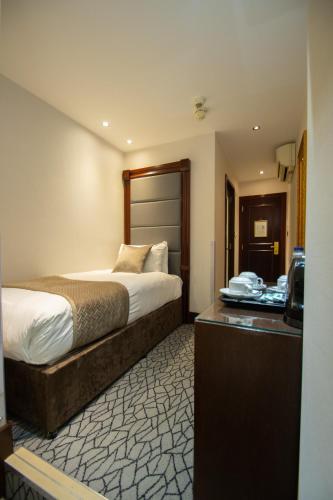 Habitación Triple Estándar del hotel Hyde Park International - Member of Park Grand Londres