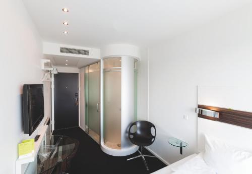 Habitación Cielo del hotel Wakeup Copenhagen Carsten Niebuhrs Gade. Foto 12