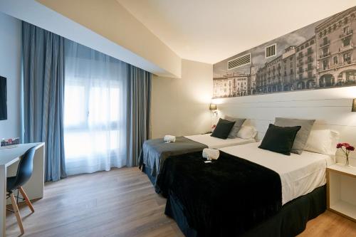 Habitación Familiar del hotel CAN PAMPLONA. Foto 1