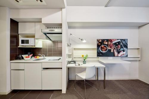 Estudio Executive con 2 camas individuales del hotel Citadines Shinjuku Tokyo. Foto 4