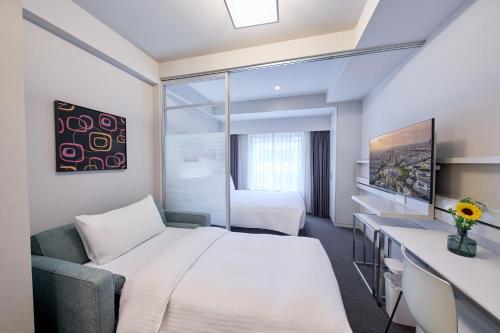Estudio Executive Doble del hotel Citadines Shinjuku Tokyo. Foto 1