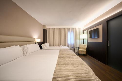 Habitación Triple del hotel Catalonia Rigoletto. Foto 5