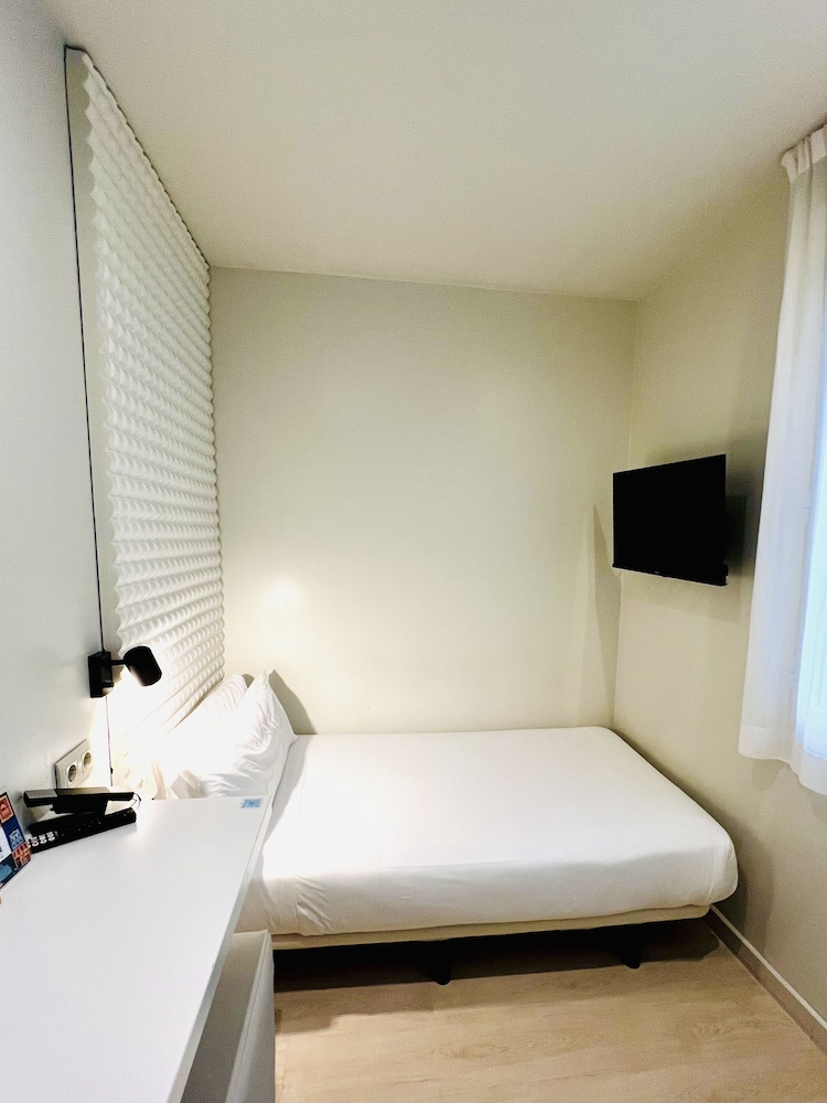 Habitación individual del hotel Urban Sea Atocha 113