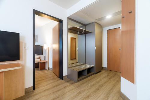 Habitación Familiar del hotel IntercityHotel Wien. Foto 2