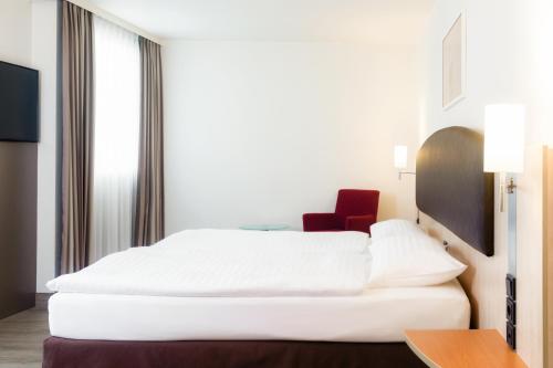 Habitación Familiar del hotel IntercityHotel Wien. Foto 4