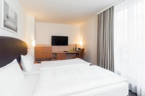 Habitación Doble Superior del hotel IntercityHotel Wien. Foto 2