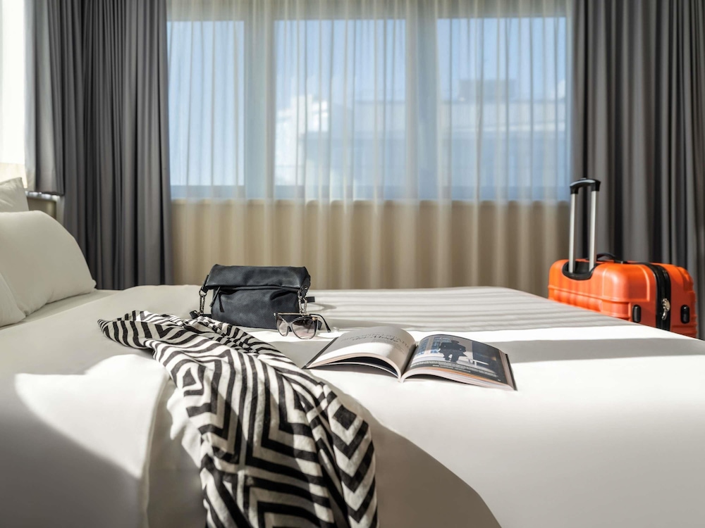 Habitación familiar, 1 cama doble del hotel Novotel Wien City. Foto 4