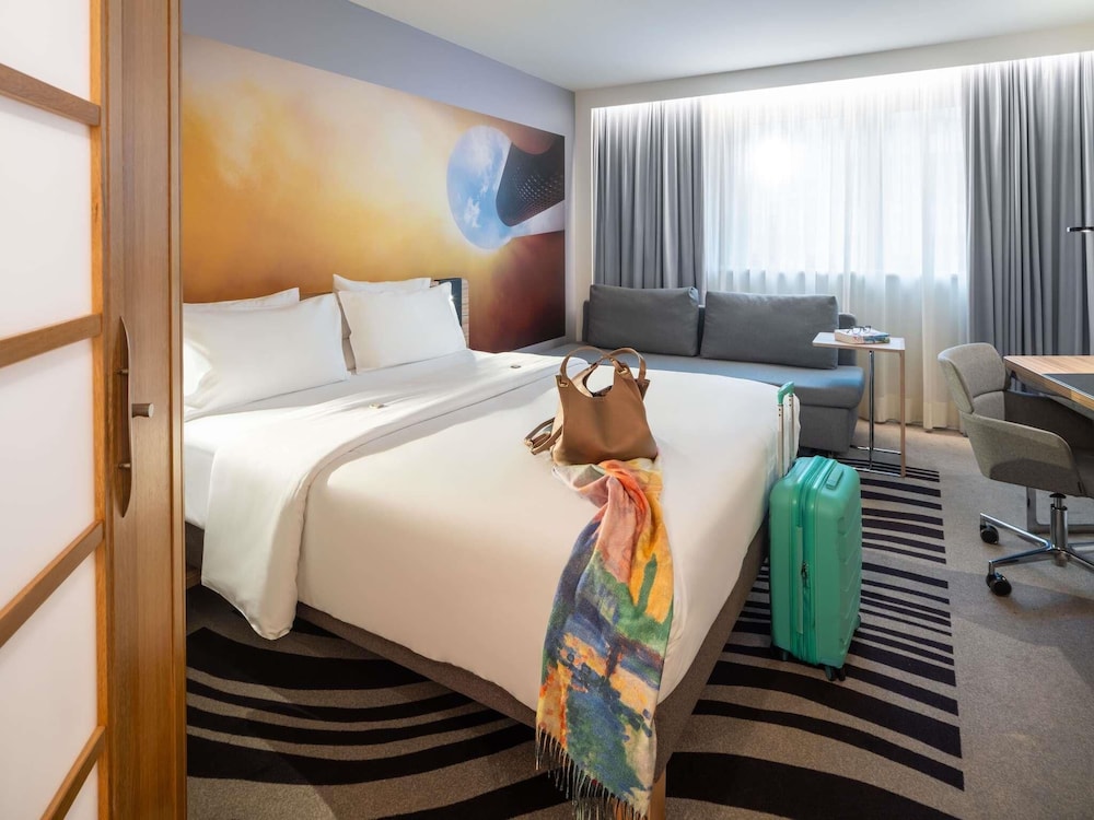 Habitación familiar, 1 cama doble del hotel Novotel Wien City. Foto 10