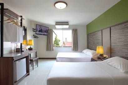 Habitación Triple Deluxe del hotel Rambuttri Village Inn and Plaza. Foto 19