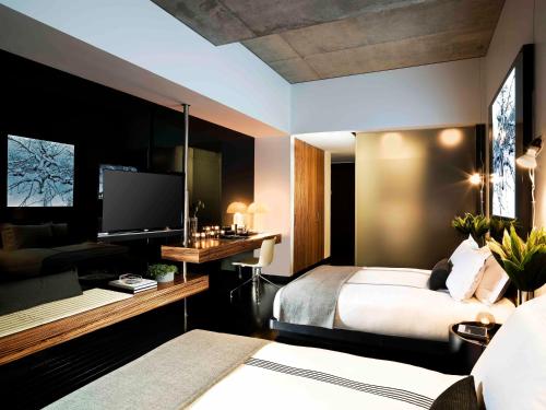 Habitación con 2 camas grandes del hotel Sixty Les