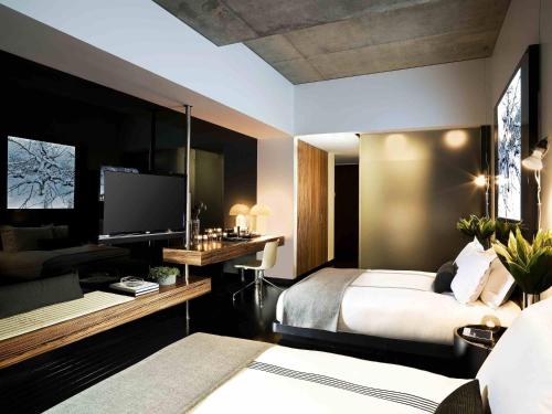 Habitación con 2 camas grandes del hotel Sixty Les. Foto 3