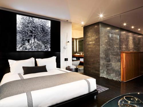 Suite Con Cocina 1 Cama king Sofá Cama incluido del hotel Sixty Les. Foto 1