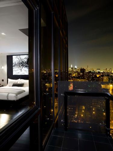 Suite del hotel Sixty Les. Foto 1