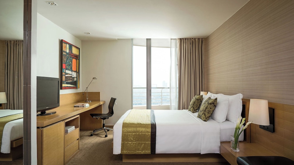 Premier Suite with Double Bed del hotel Jc Kevin Sathorn Bangkok. Foto 1