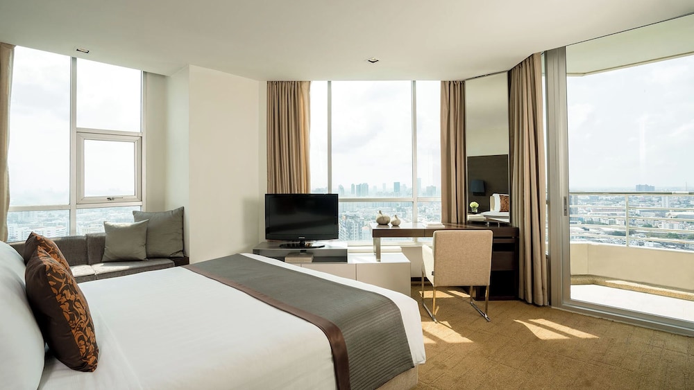 Skyline Two Bedroom Suite (with 1 king, 2 single bed) del hotel Jc Kevin Sathorn Bangkok