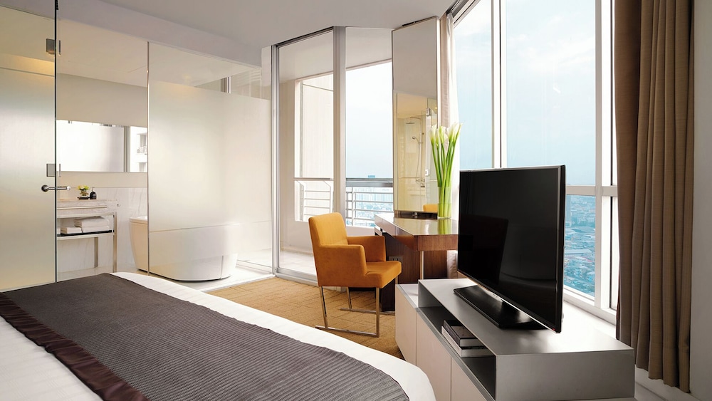 Skyline Two Bedroom Suite (with 1 king, 2 single bed) del hotel Jc Kevin Sathorn Bangkok. Foto 3
