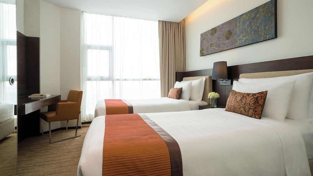 Skyline Two Bedroom Suite (with 1 king, 2 single bed) del hotel Jc Kevin Sathorn Bangkok. Foto 4