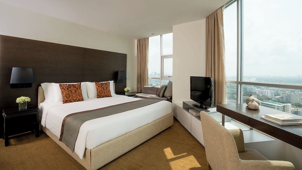 Two Bedroom Suite (with 1 king, 2 single bed) del hotel Jc Kevin Sathorn Bangkok. Foto 1