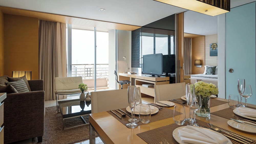 Skyline One Bedroom Suite with Twin Bed del hotel Jc Kevin Sathorn Bangkok. Foto 2