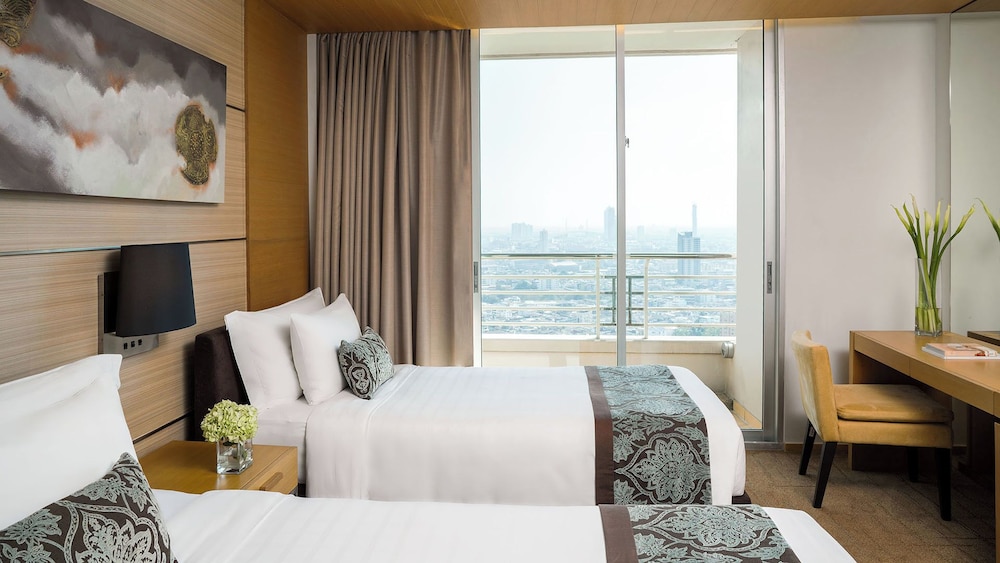 One Bedroom Suite with Twin Bed del hotel Jc Kevin Sathorn Bangkok