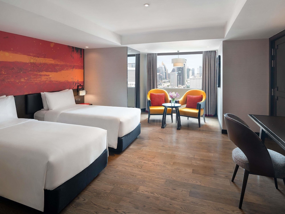 Habitación Deluxe con dos camas individuales del hotel Mercure Bangkok Sukhumvit 11