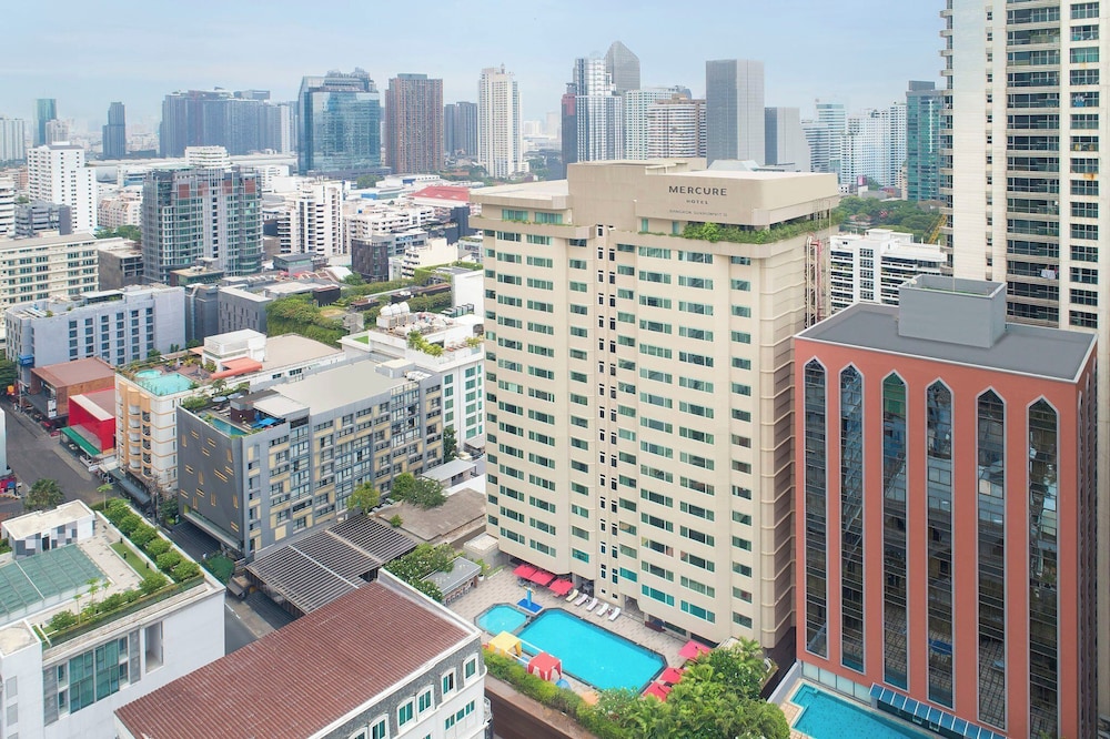 Habitación Deluxe con dos camas individuales del hotel Mercure Bangkok Sukhumvit 11. Foto 6